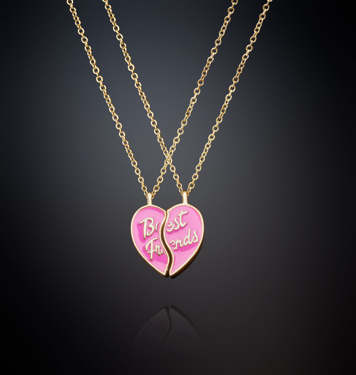 PAIR OF NECKLACES WITH PINK HALF HEART PENDANTS