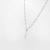 NECKLACE WITH SMALL PEARL CROSS PENDANT